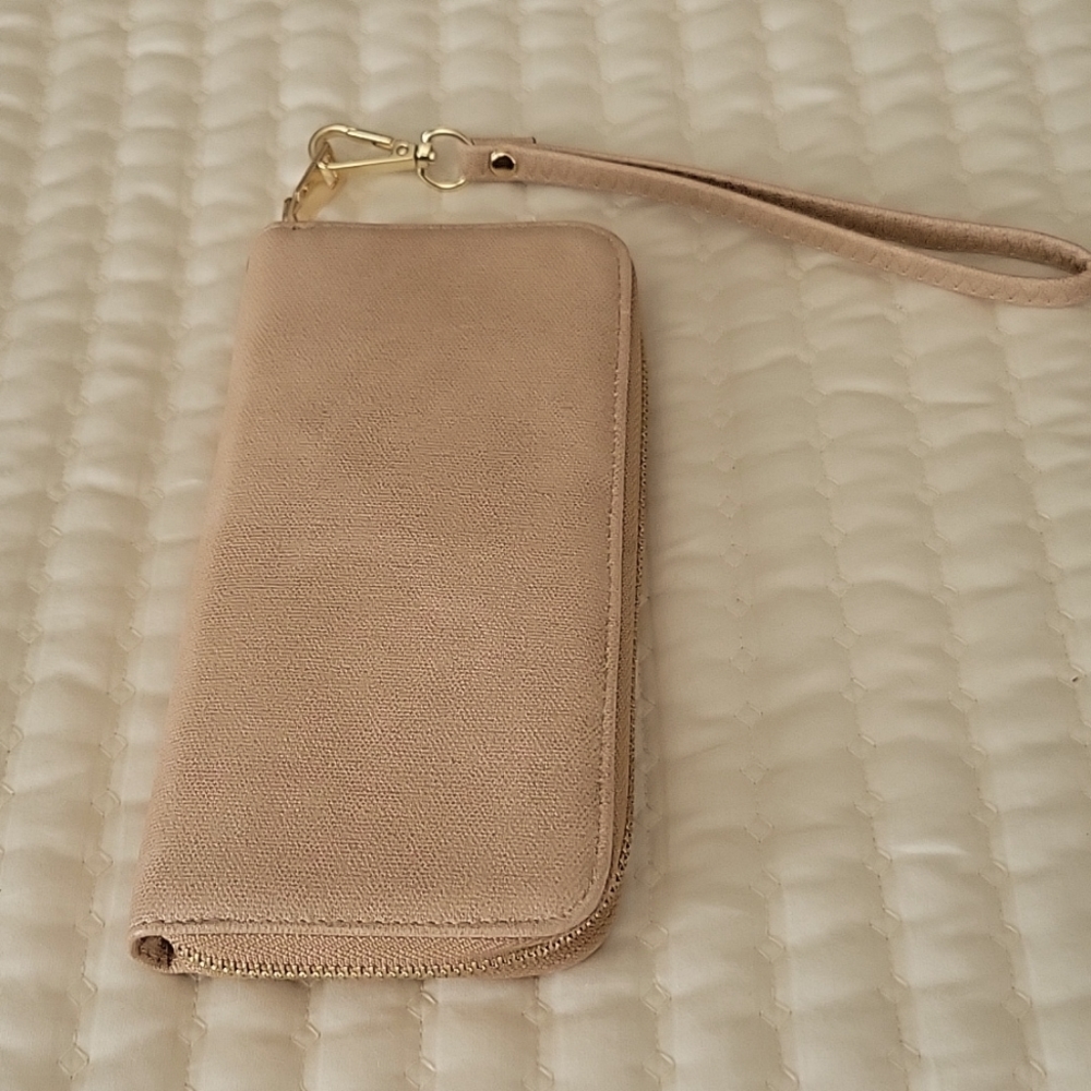 Wristlet  like new never used...Beige